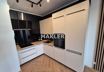 | kawalerka 28,58 m² | balkon | miejsce postojowe