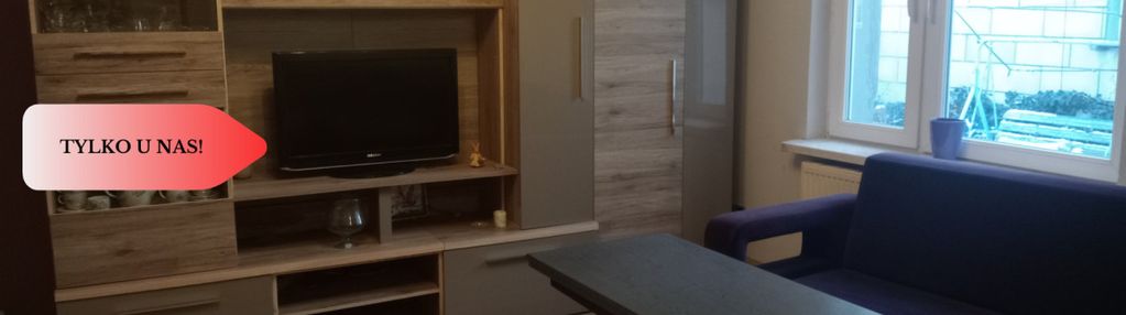 Dom z budynkiem gospodarczym.