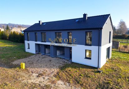 Nowoczesny dom w zabudowie bliźniaczej - rogoźnik