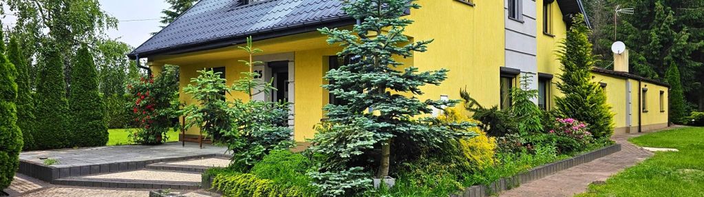 Dom w stanie surowym z pięknym ogrodem