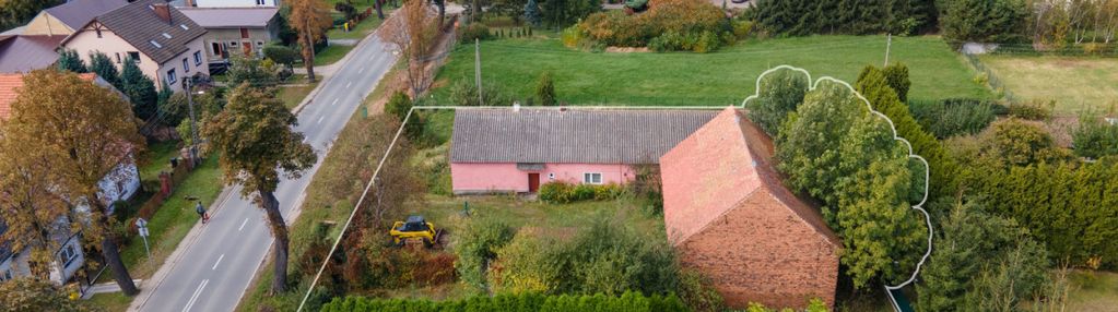 Działka z zabudowaniami w lutyni obok dino