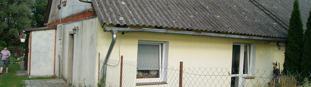 Pół domu skrajnego z działką i ogrodem
