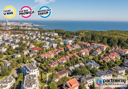 Działka z niedokończonym budynkiem szeregowym