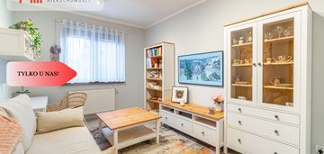 Dom: dwa mieszkania i przestrzeń na działalność