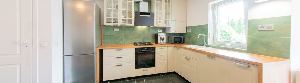 Mieszkanie z ogródkiem, garażem i klimatem!