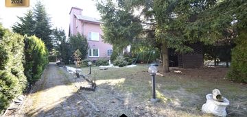 Dom/8 pokoi/garaż/2 mieszkania/działka 705m2