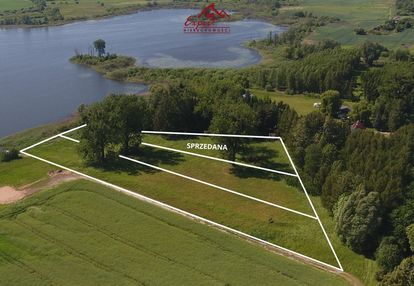 Działki z linią brzegową jeziora łabędź