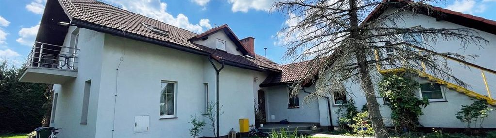 Dom na 18arowej działce wraz z budynkiem usługowym