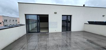 Dwupoziomowy apartament z tarasem na dachu