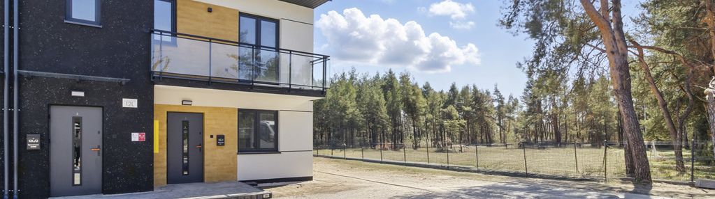 Dwupoziomowy apartament z widokiem na zieleń