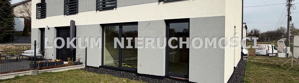 Dom w zabudowie bliźniaczej.