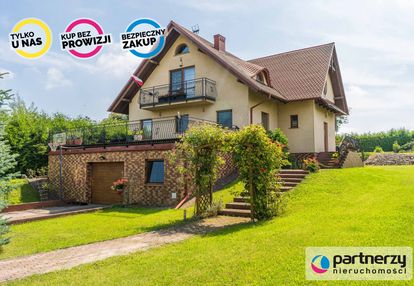 Piękny dom położony w malowniczej scenerii!