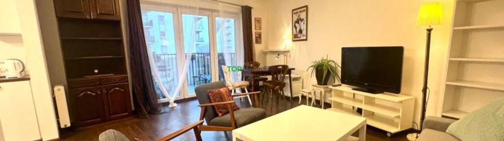 Salon z aneksem i sypialnia, balkon, garaż