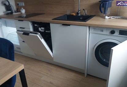 Dwupokojowe mieszkanie z miejscem parkingowym.