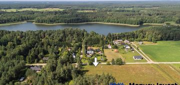 Działki budowlane w piasutnie - przy ścianie lasu i 230 m do jeziora