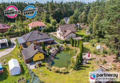 Dom, własny kawałek lasu, staw z koncertem żab