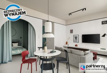 Designerskie mieszkanie z ogrókiem i halą garażową