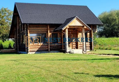 Dom z bali na dużej działce z projektem zabudowy