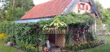 Mały domek na dużej działce w centrum miłomłyna