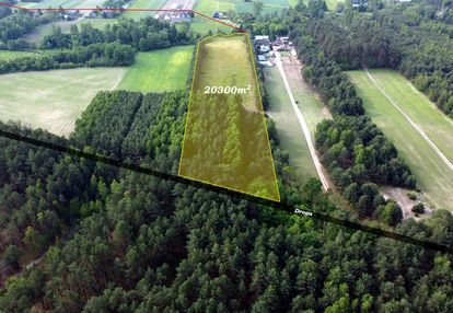 Piękna częściowo zadrzewiona działka rolna.