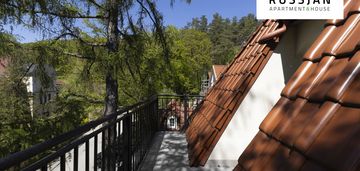 Apartament w budynku z windą i halą garażową