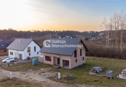 Dom w głogowie małopolskim stan surowy otwarty