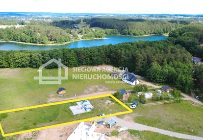 Działka z rozpoczętą budową 130 m od jeziora.