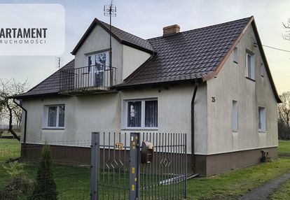 Dom z zabudowaniami na działce 1,24 ha