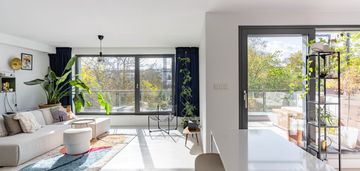 Nowoczesne dwupoziomowe mieszkanie z tarasem