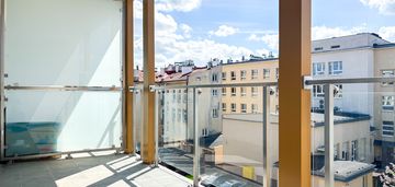 Apartament 56 m² w centrum z garażem