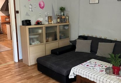 Mieszkanie w drewnianym domku wielorodzinnym