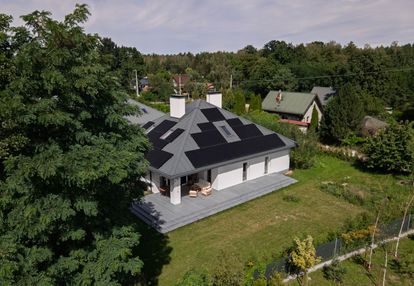 Dom w pęclinie | działka 1241 m² | garaż 62 m2