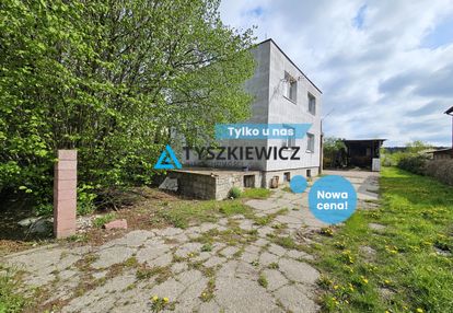 Dom mieszkalny z budynkami pod usługi.