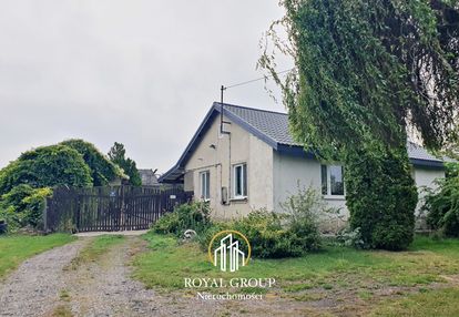 Na sprzedaż 64 arowa działka z domem.