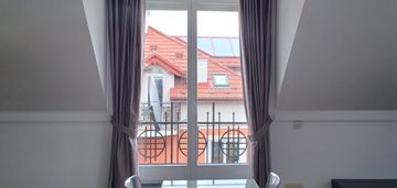 Apartament z widokiem na zieleń