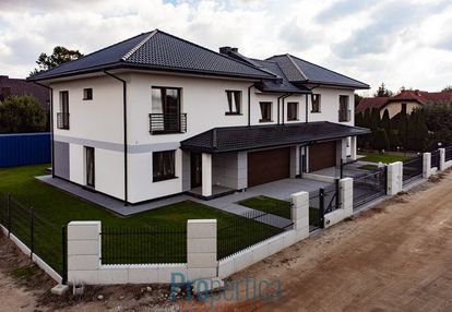 Połówka bliźniaka z garażem na 2 samochody