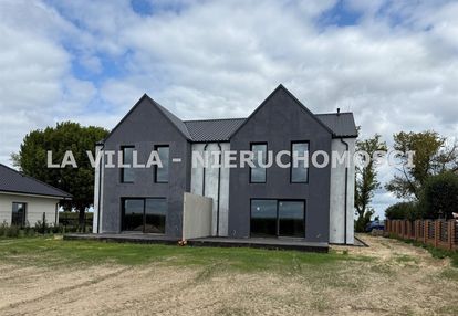 Nowoczesny dom w zabudowie bliźniaczej w dąbczu