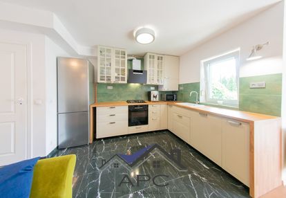 Mieszkanie z ogródkiem, garażem i klimatem!