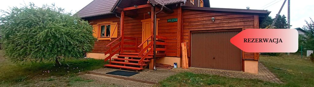 Drewniany wiejski dom w borach tucholskich