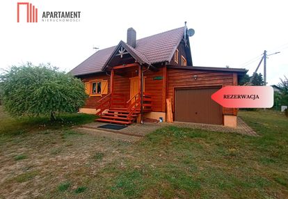 Drewniany wiejski dom w borach tucholskich