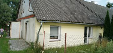 Pół domu skrajnego z działką i ogrodem