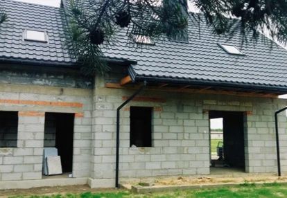 Bliźniak 150 m²,działka 606 m², stan otwarty.