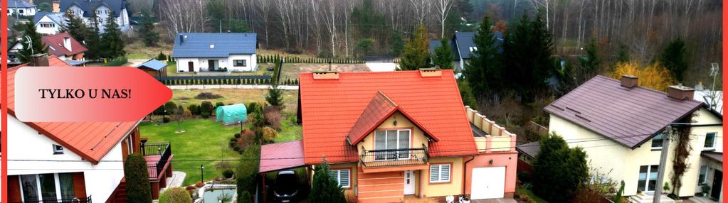Dom w kolinczu z dwoma garażami i działką 900 m² –
