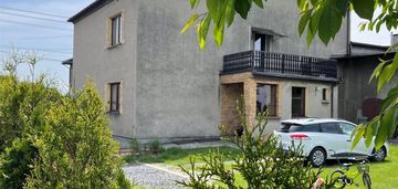 Przestronny dom z ogrodem, garaż, działka 0,1140 h
