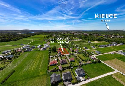 Działka budowlana 1302 m², media, szkoły, natura.