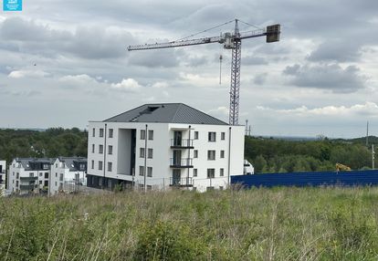 Balkon i jasna kuchnia i przy planowanej pkm