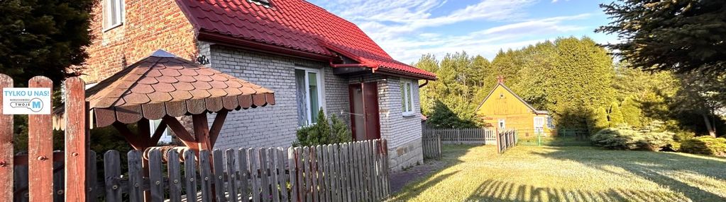 Działka z dwoma domami i dostępem do rzeki