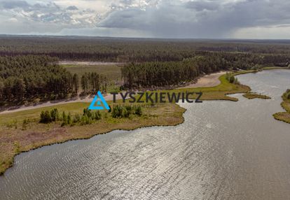 Działka nad jeziorem w otulinie lasu