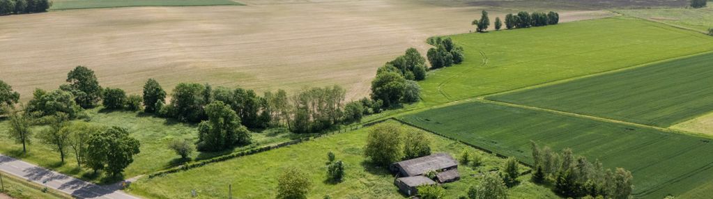 Działka budowlana 63 ar | uzbrojona | z budynkami