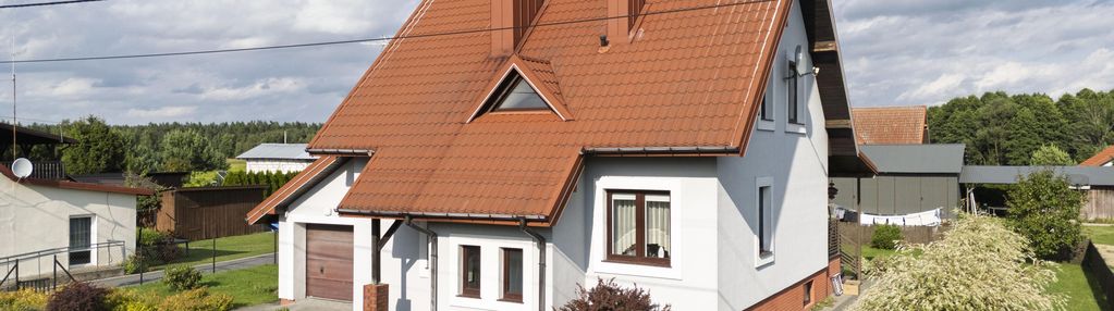 Dom w prusowym borku z halą/warsztatem 72 m2